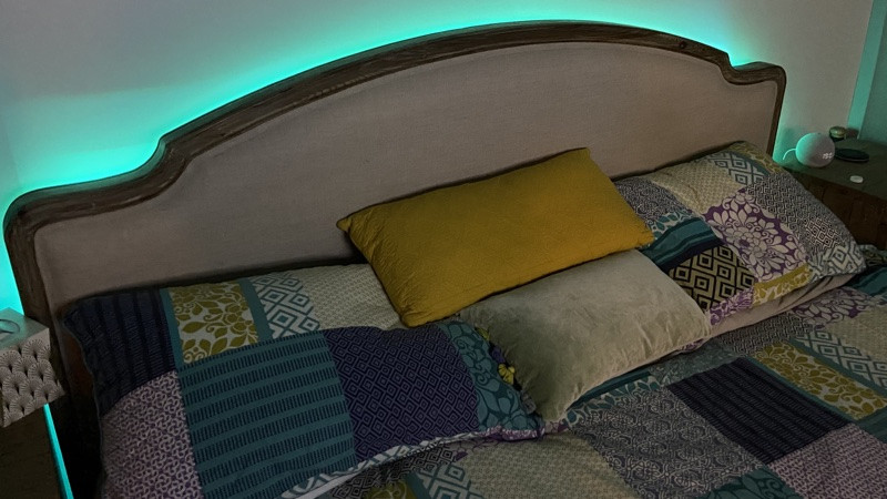Nanoleaf Essentials lightstrip behind bed