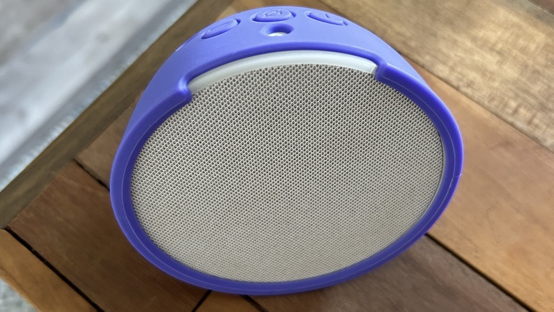 Amazon Echo Pop in purple silicone sleeve