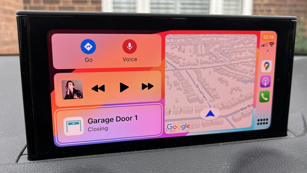 Apple CarPlay showing Meross garage open option